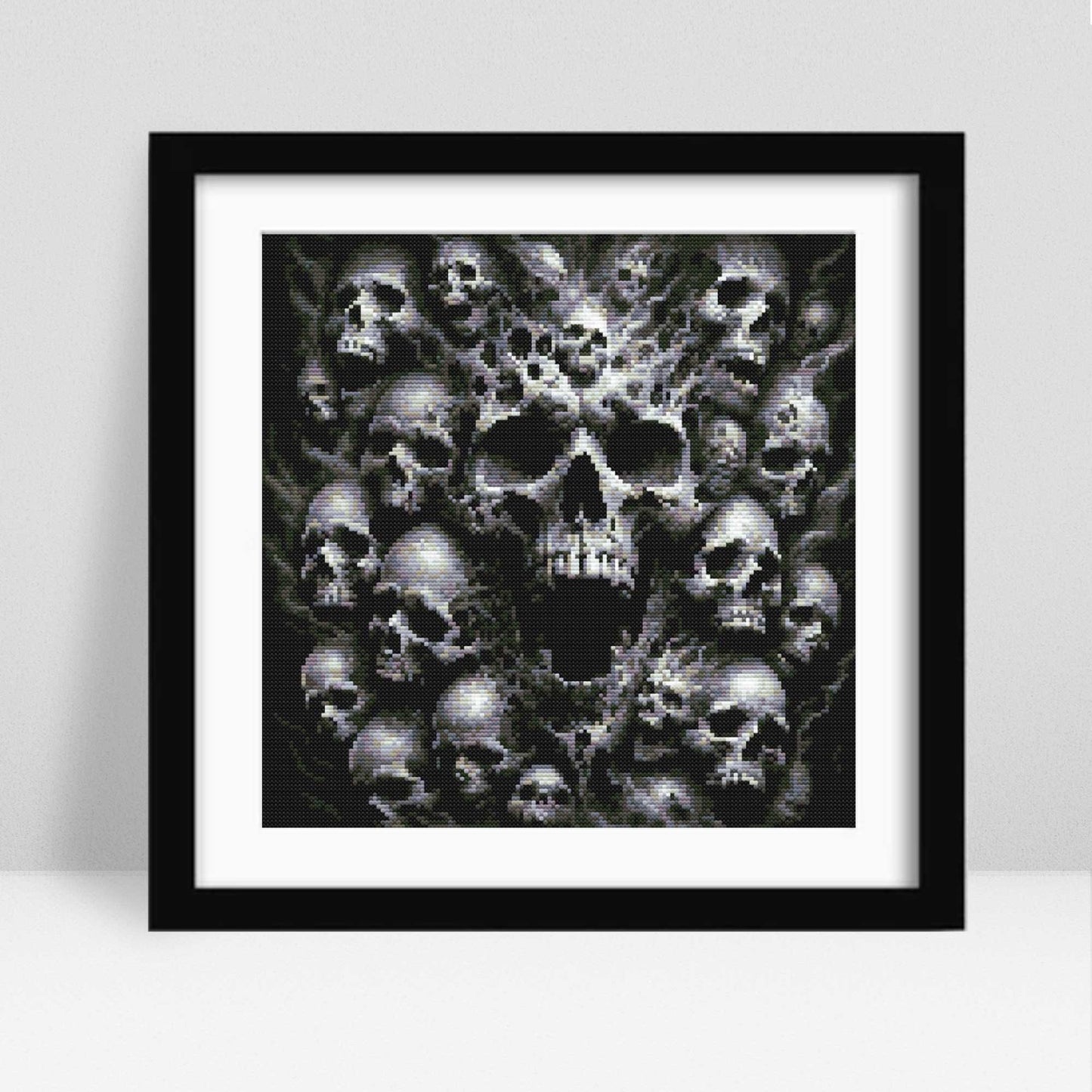 Framed artwork of a skull design on a white background