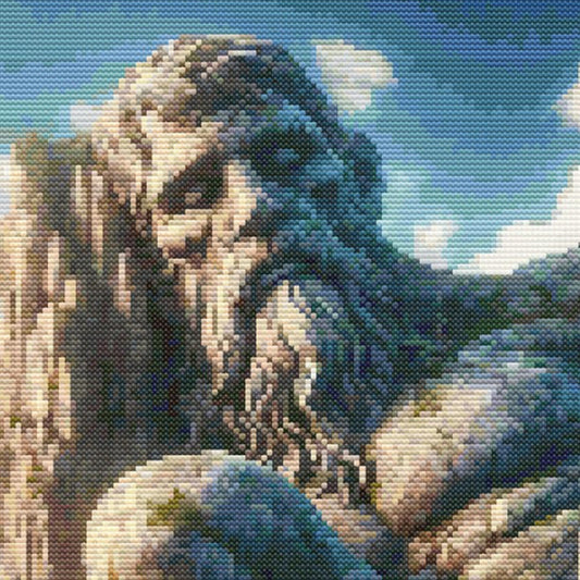 Close-up of Majestic Petrified Giant and Castle Cross Stitch Pattern showing the giant stone face, rocky texture, sky detail, and visible counted cross stitch texture.