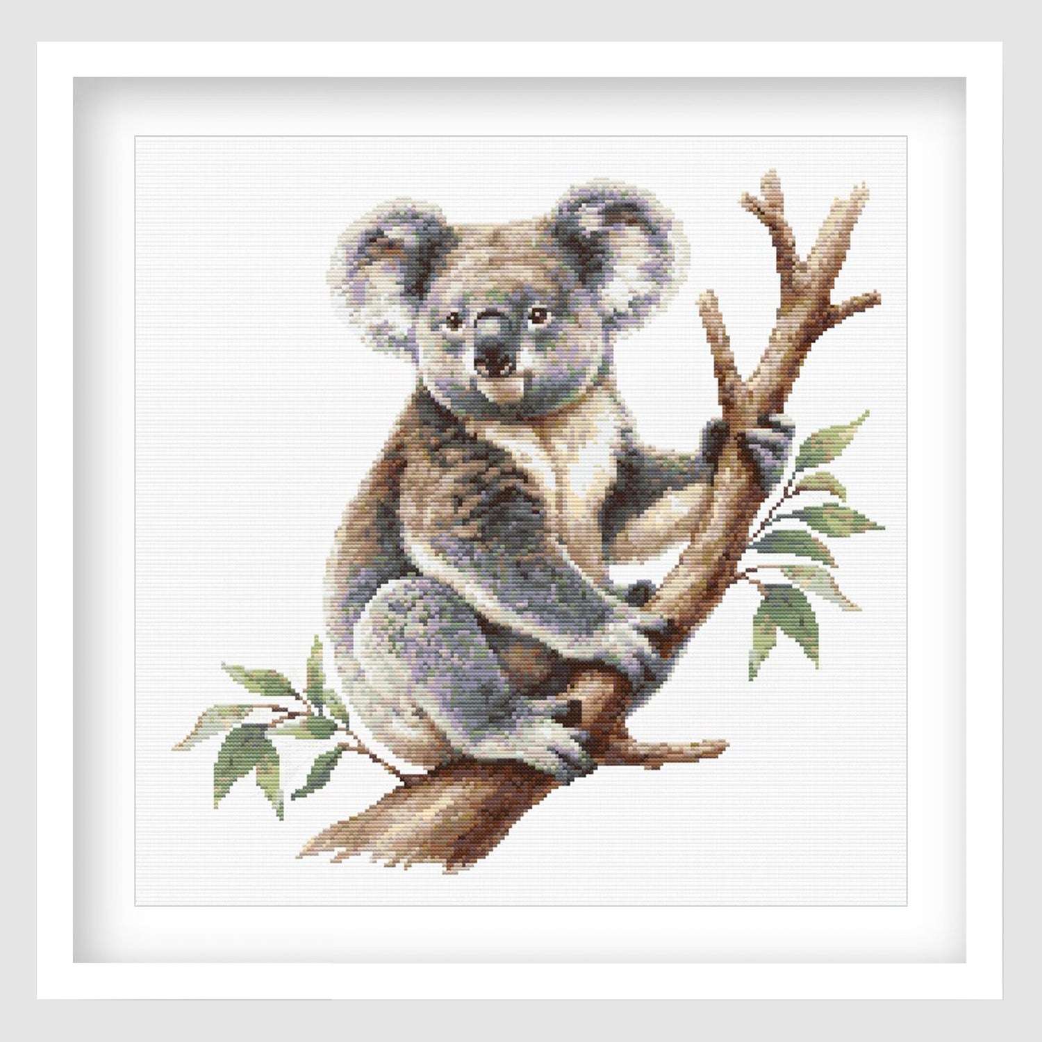 Wild animal cross stitch pattern collection image featuring a koala perched on a branch in a framed artwork style.