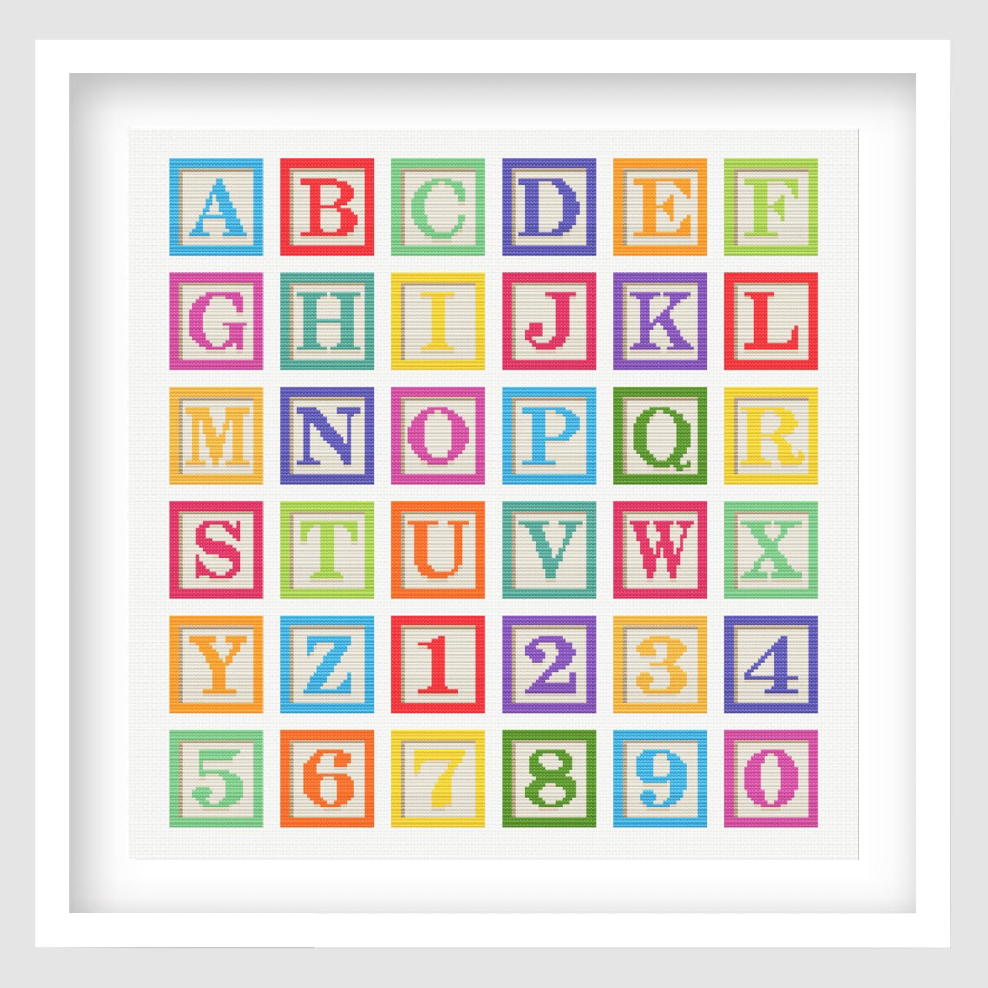 Colourful alphabet cross stitch pattern featuring bright block-style letters A to Z and numbers 0 to 9 in individual framed squares.