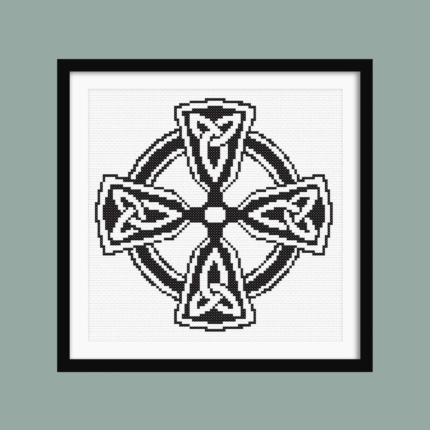 Celtic Infinity Cross Stitch Pattern displayed in a sage green frame, styled as symbolic black and white wall art.