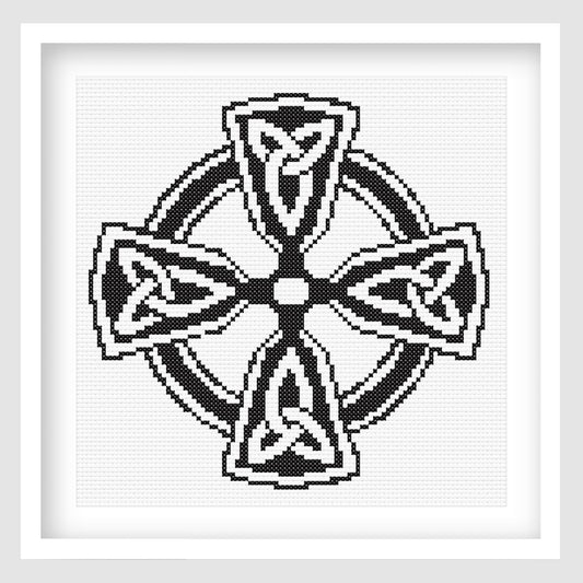 Celtic Infinity Cross Stitch Pattern displayed in a white frame, featuring a black and white Celtic cross design with knotwork details.