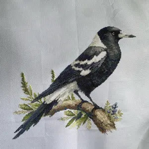 Finished magpie cross stitch stitched by a Stitch Junction customer