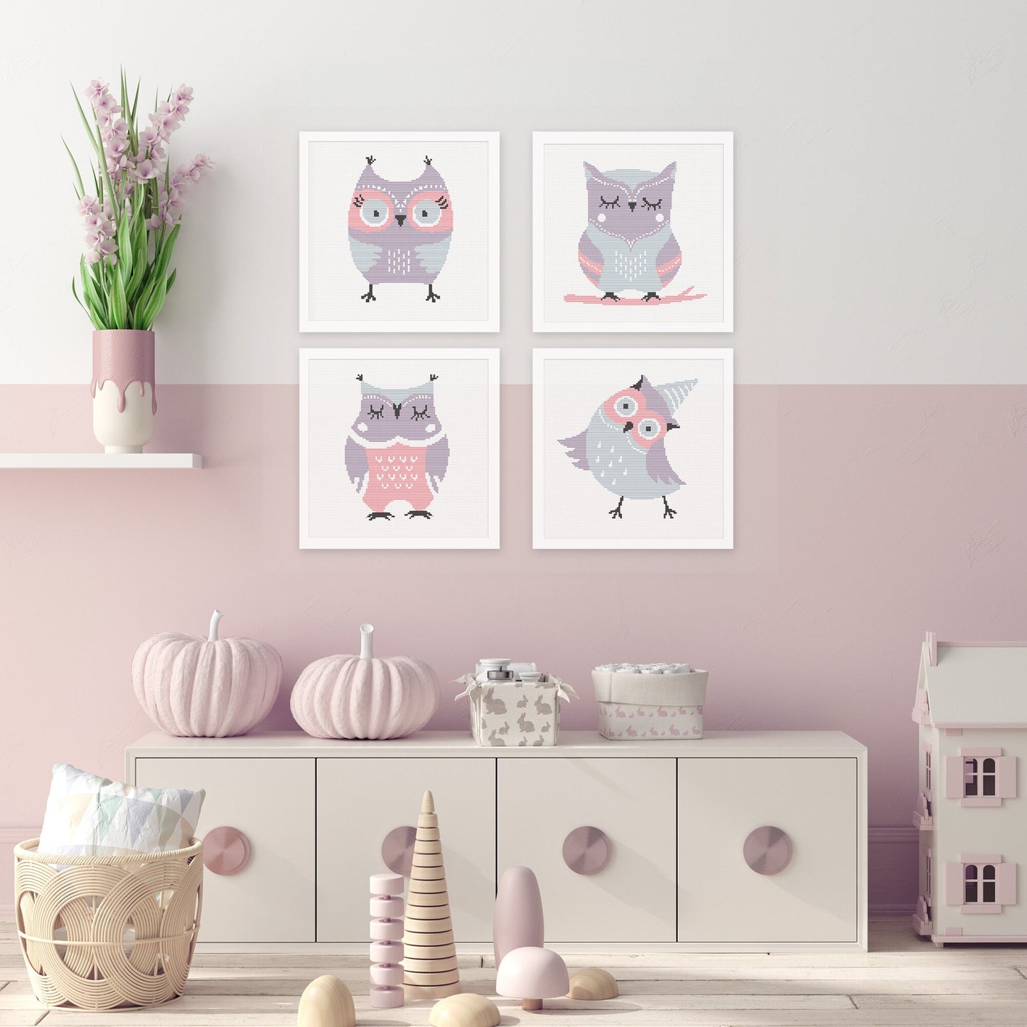 Collection of four cute owl cross stitch patterns displayed together as coordinated nursery wall art in soft pastel colours.