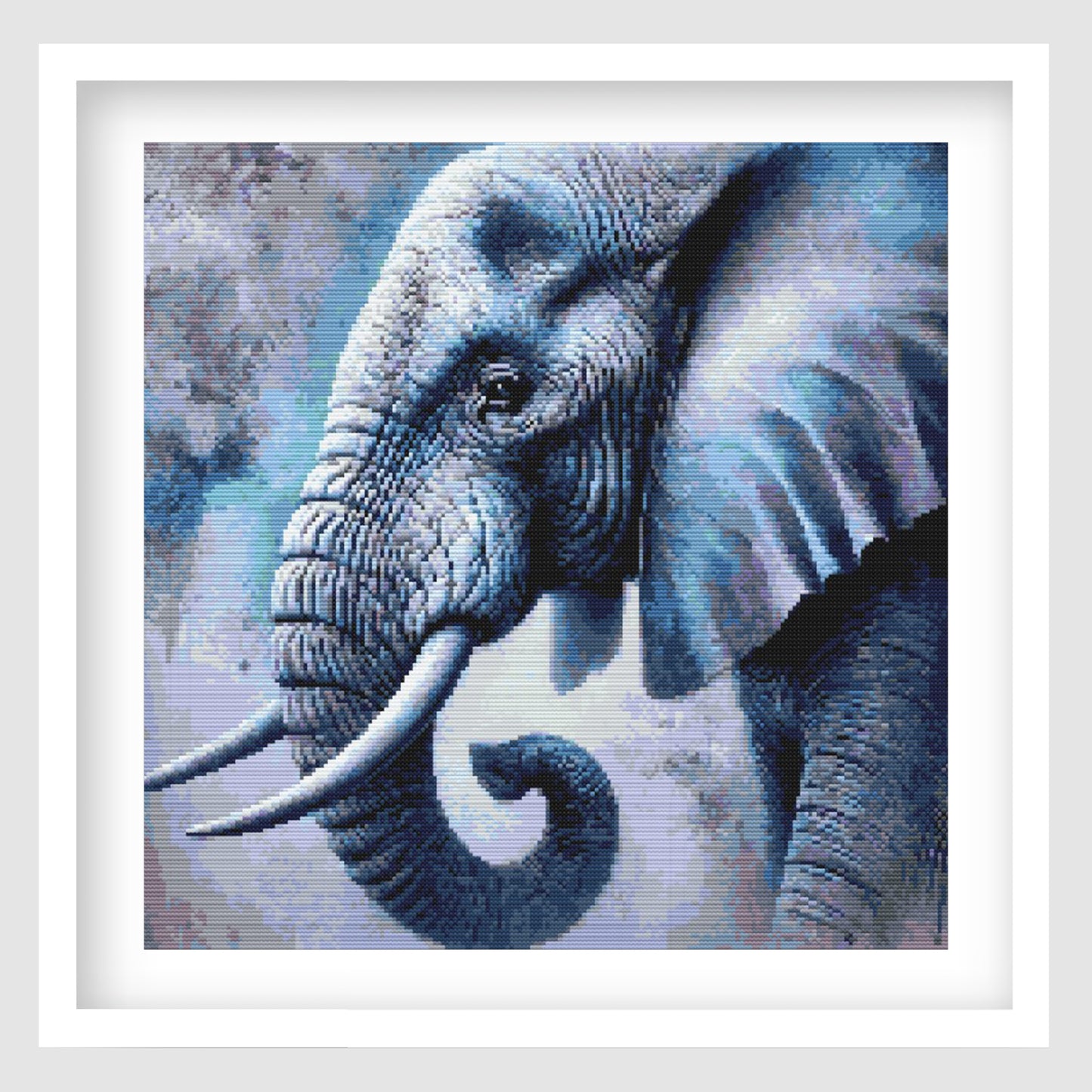 Elephant cross stitch pattern featuring a detailed blue-toned elephant portrait with tusks, curled trunk, textured skin and a soft abstract wildlife background.