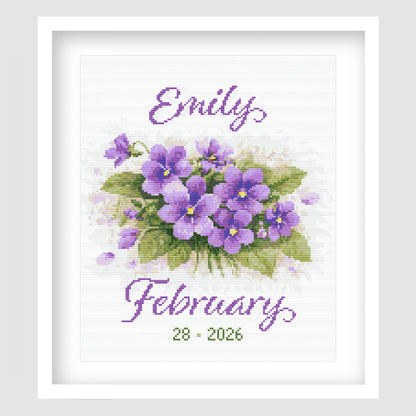 February Birth Flower Cross Stitch Pattern displayed in a white frame, featuring purple violets with a personalised baby name and birth date.