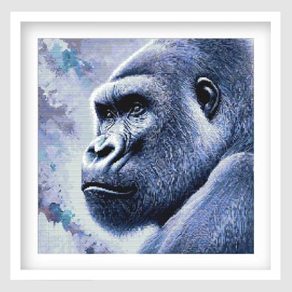 Gorilla cross stitch pattern featuring a detailed blue-toned gorilla portrait with expressive eyes, textured fur and a soft abstract background, designed as a wildlife digital PDF chart.