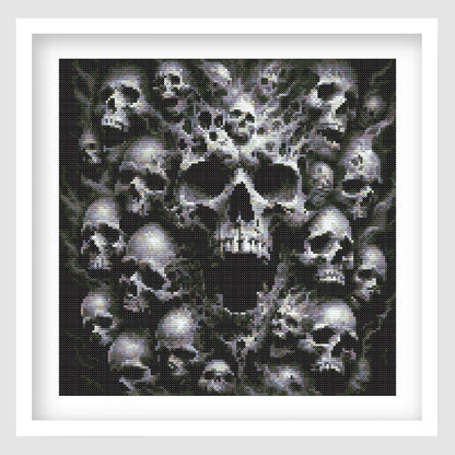 Framed artwork of a central skull surrounded by smaller skulls on a white background