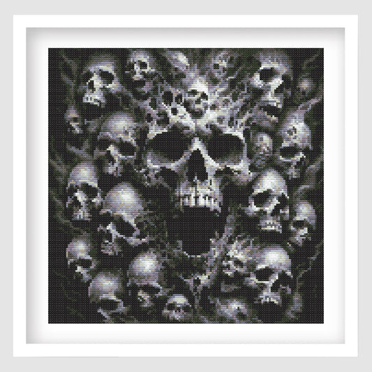 Framed artwork of a central skull surrounded by smaller skulls on a white background