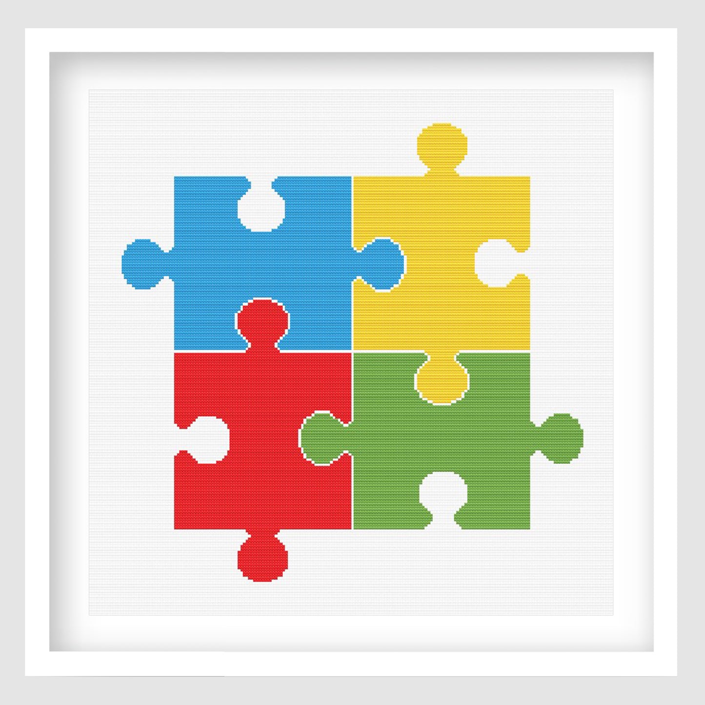 Colourful puzzle pieces cross stitch pattern featuring four interlocking jigsaw pieces in blue, yellow, red and green on a clean white background.