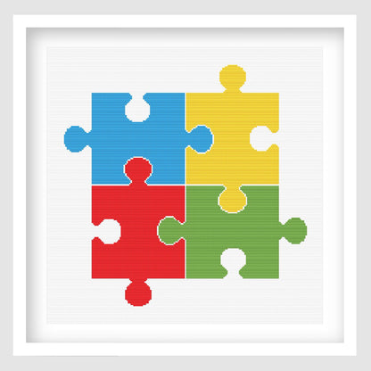 Colourful puzzle pieces cross stitch pattern featuring four interlocking jigsaw pieces in blue, yellow, red and green on a clean white background.