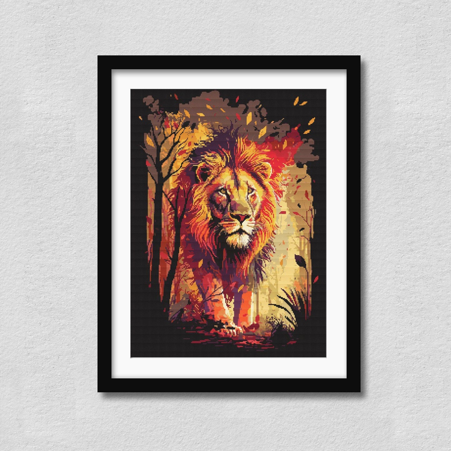 Framed artwork of a lion in a forest setting on a gray wall.