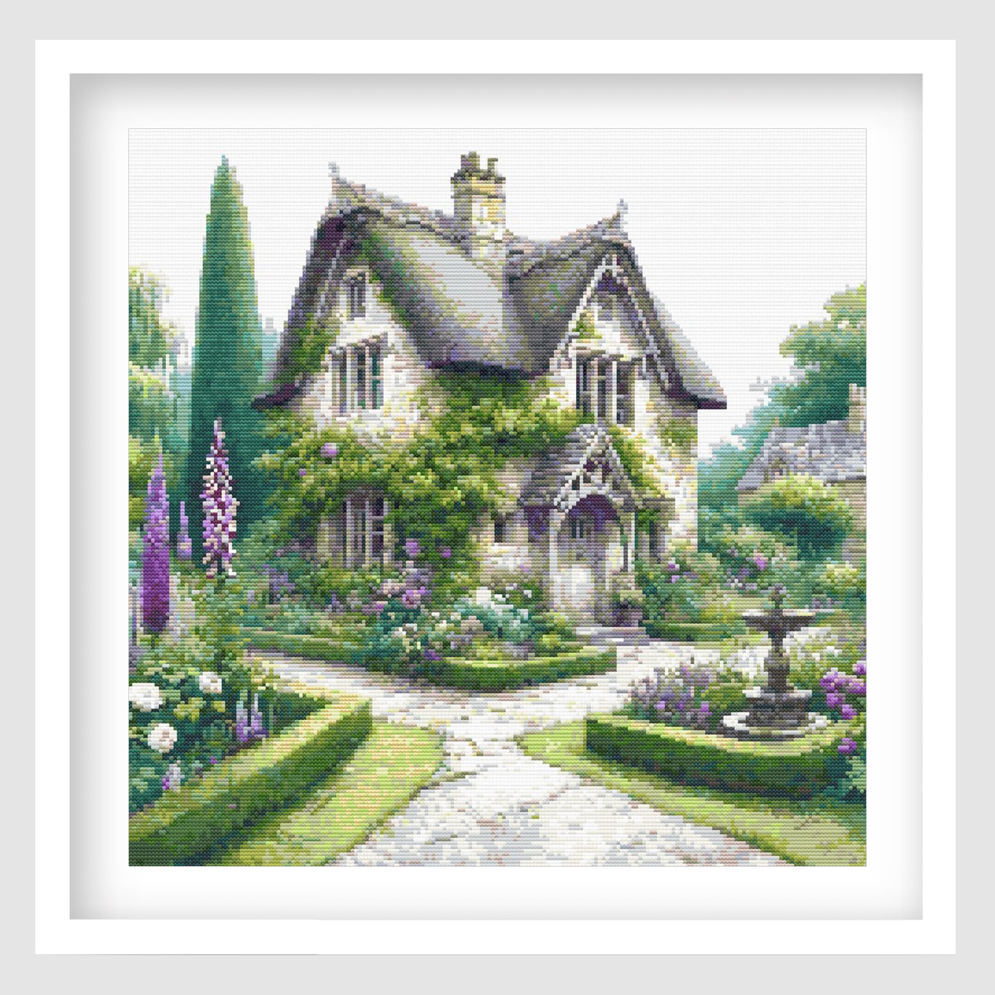Cottage garden cross stitch pattern featuring a charming stone house with climbing greenery, flower beds, a winding path and a classic English garden setting.