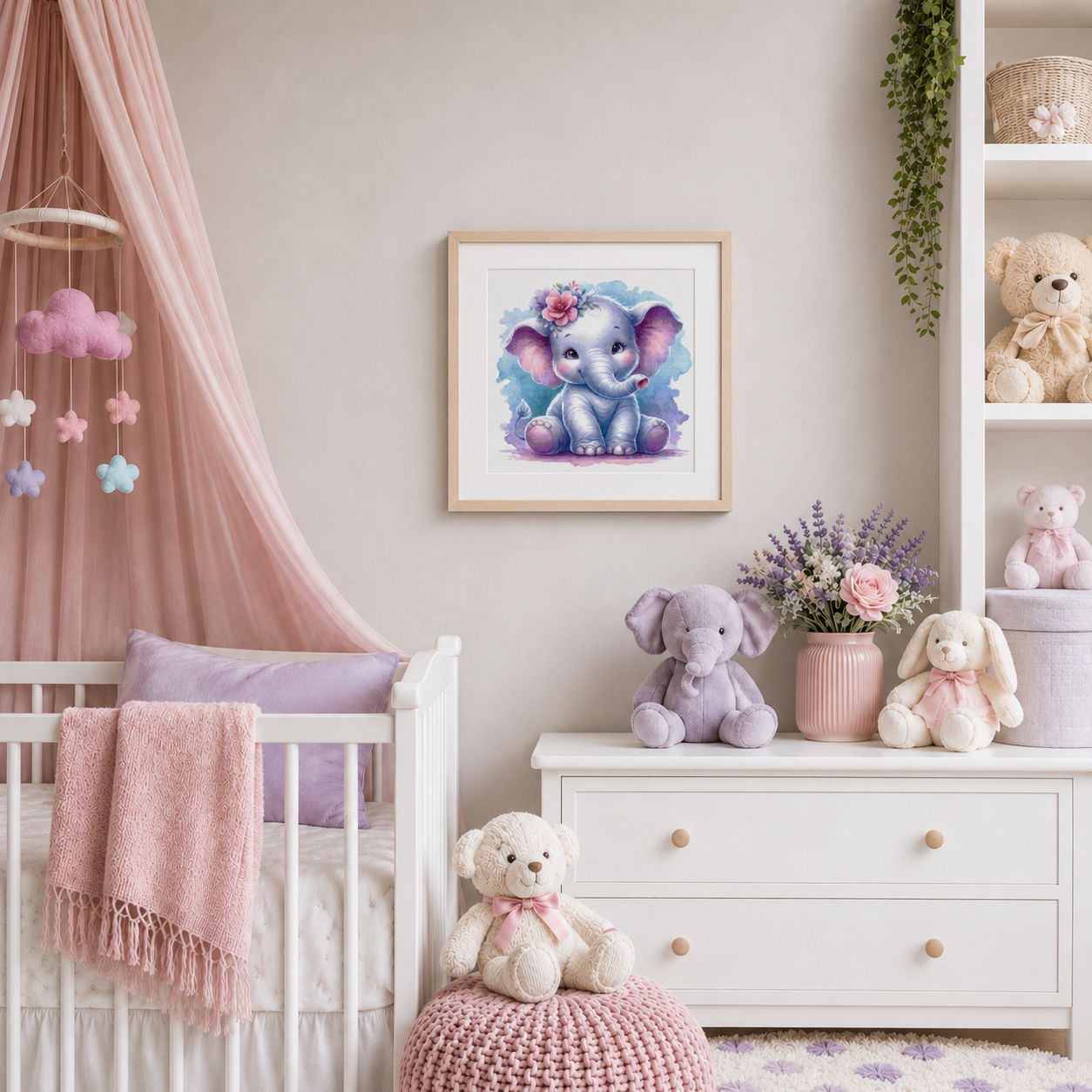 Elephant cross stitch pattern displayed as framed nursery wall art in a soft pink and lavender baby room with plush toys and crib decor.