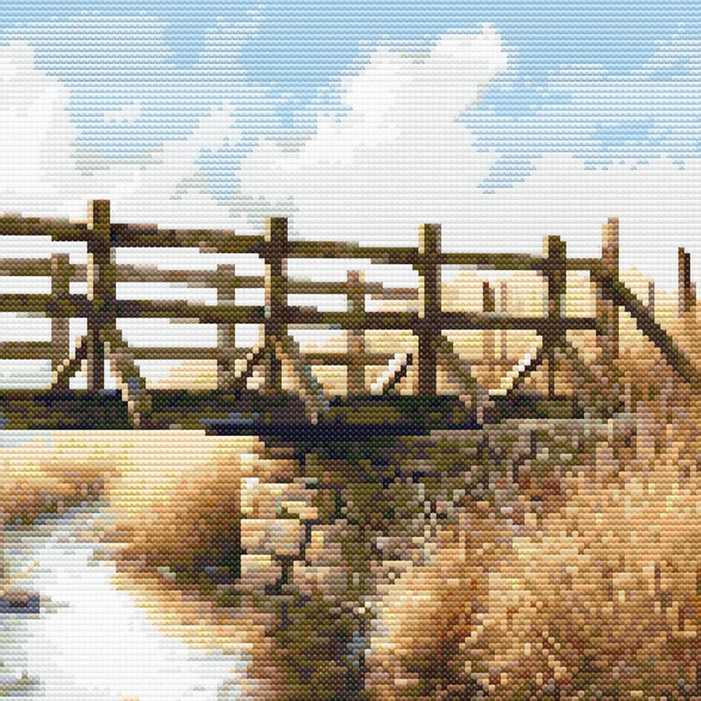Wooden bridge over a river with a blue sky and clouds in the background
