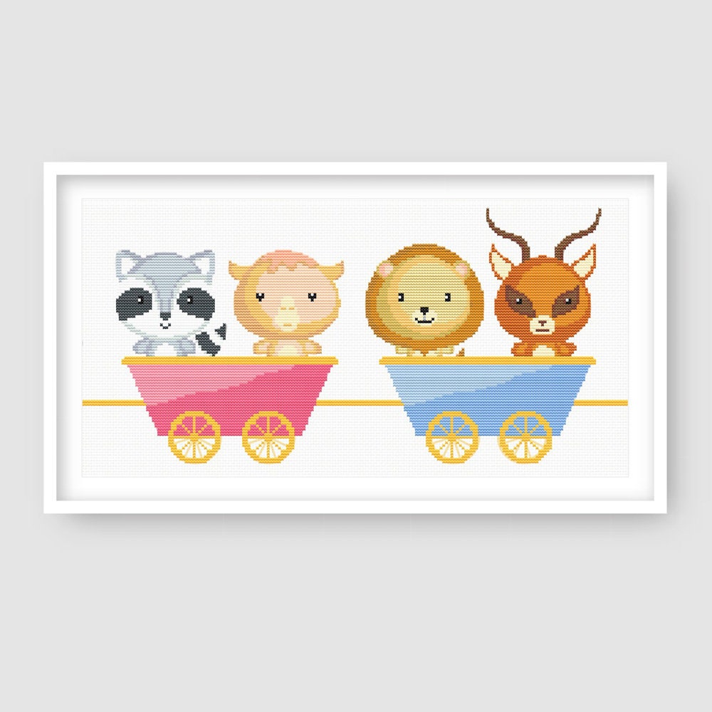 Close-up of Animal Train Cross Stitch Pattern Set showing elephant and tiger characters riding in pastel train carriages.