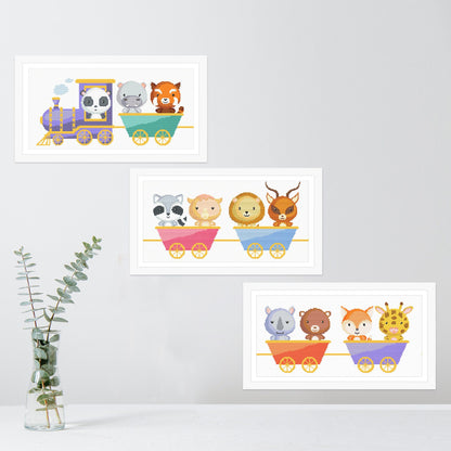 Animal Train Cross Stitch Pattern Set shown as framed nursery wall art with cute animal train designs, white frames, soft room styling, and eucalyptus decor.