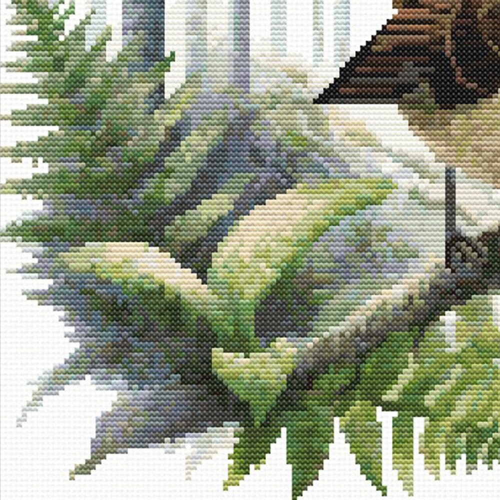 Close-up of the native New Zealand fern detail featured in the Fantail Pīwakawaka cross stitch design.
