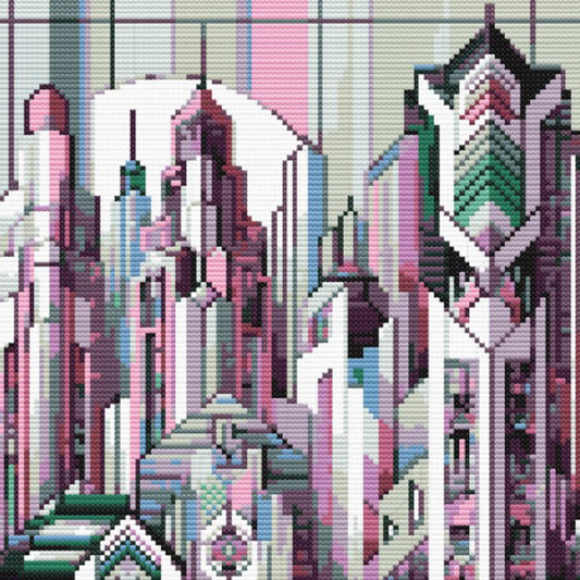 Close-up of Art Deco City Cross Stitch Pattern showing geometric building detail, pink and teal accents, and visible stitch texture.
