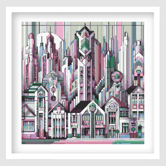 Art Deco City Cross Stitch Pattern displayed as framed wall art with a geometric skyline, decorative architecture, and soft pink, teal, black, and cream tones.