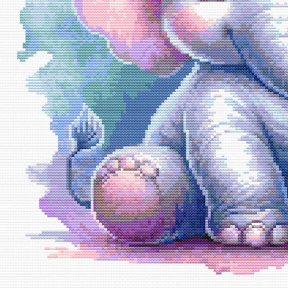 A close up of the baby elelphant cross stitch. Showing the feet and the tail in detai.