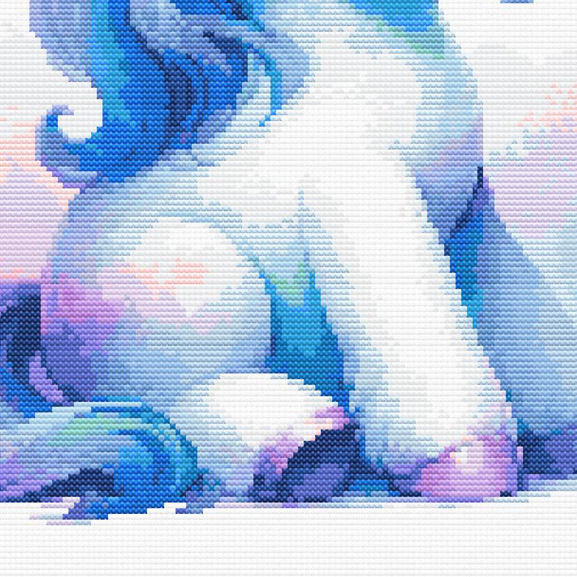 Close-up of Baby Unicorn Cross Stitch Pattern showing the unicorn body, pastel blue and purple detail, and soft magical styling.