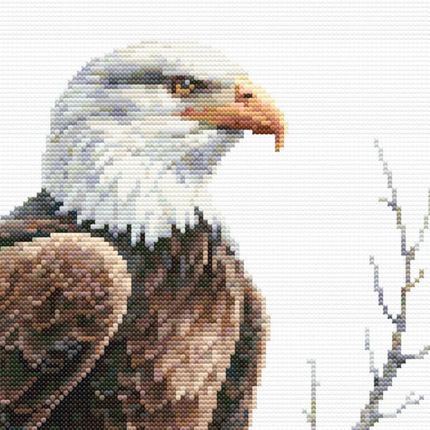 Cross-stitched bald eagle on a white background