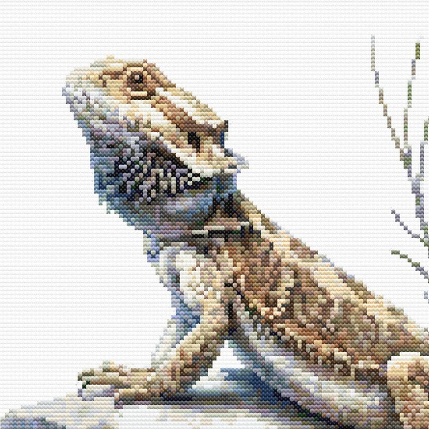 Close-up of Bearded Dragon Lizard Cross Stitch Pattern showing the lizard head, textured scales, claws, and visible counted cross stitch texture.
