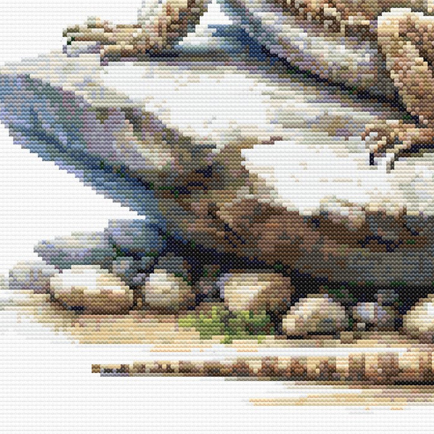 Close-up of Bearded Dragon Lizard Cross Stitch Pattern showing rocky ground, lizard body detail, natural colours, and reptile texture.