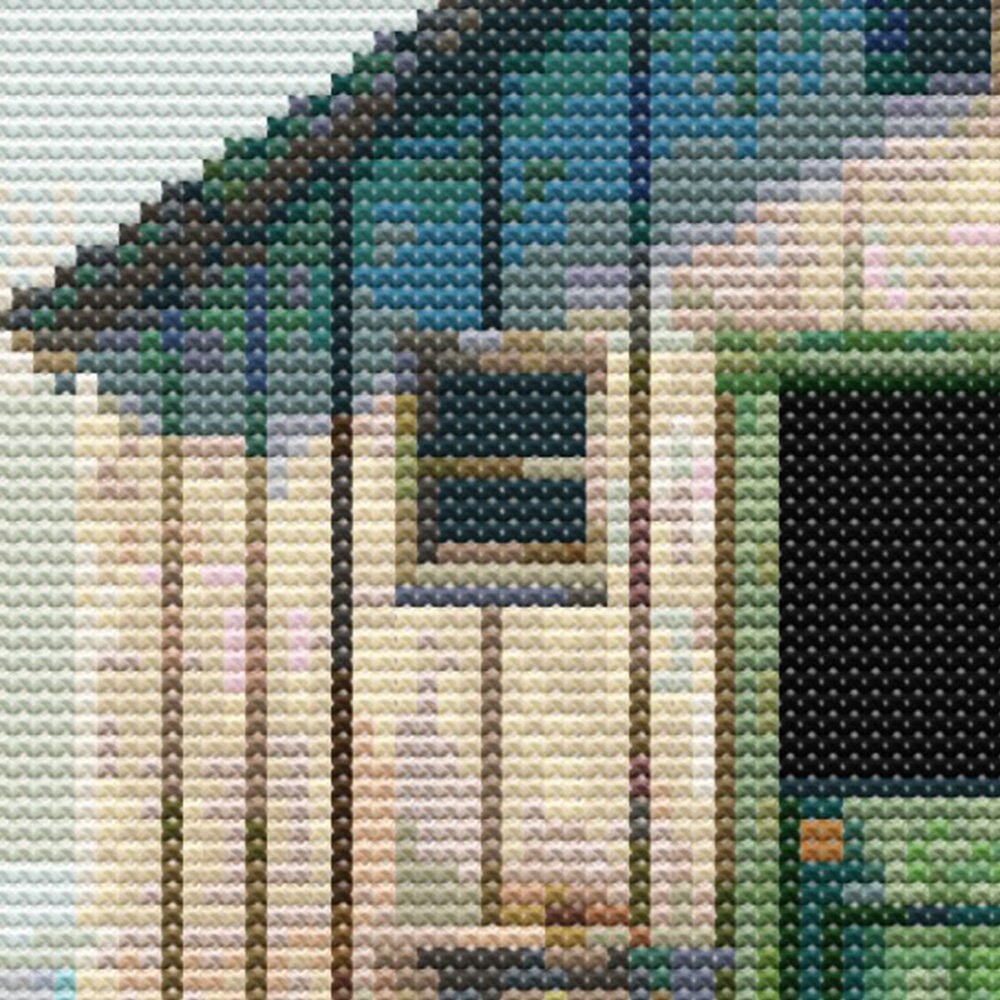 Close-up of Boat Shed Cross Stitch Pattern showing the weathered shed wall, open doorway, timber texture, and coastal stitching detail.