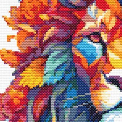 Colorful abstract design with a lion's face made from small colored pieces.