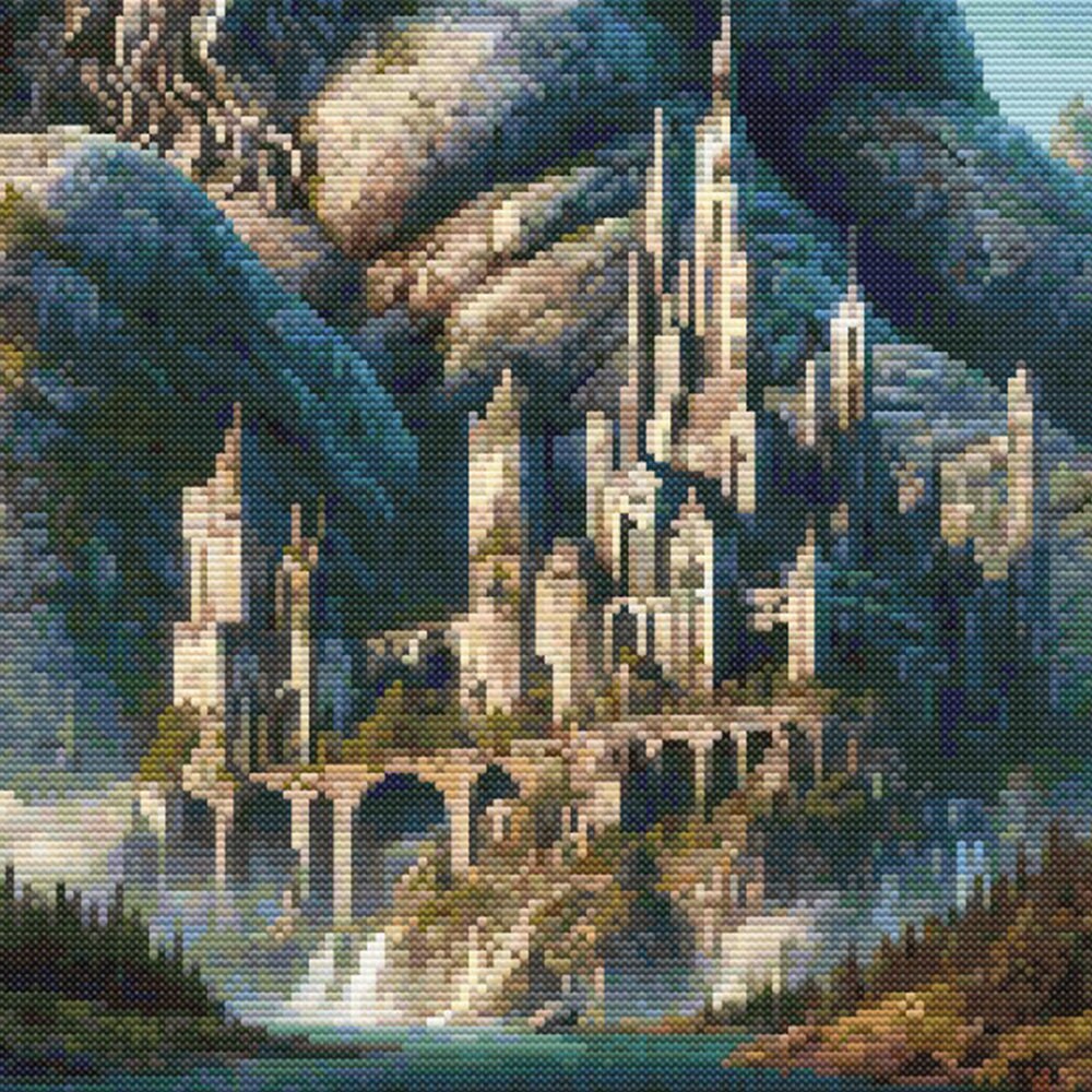 Close-up of Majestic Petrified Giant and Castle Cross Stitch Pattern showing the castle, stone giant, mountain landscape, and fantasy architecture detail.