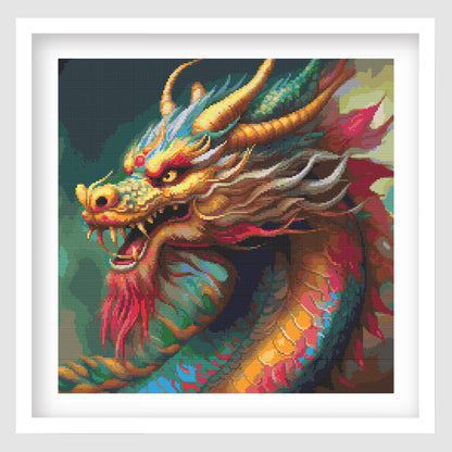 Cross stitchof a colourful chinese dragon in full coverage, reds and yeallows with green and blues.