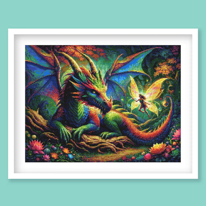 Dragon and Fairy Cross Stitch Pattern displayed in a blue frame as colourful fantasy wall art with a dragon, fairy glow, and enchanted forest scene.