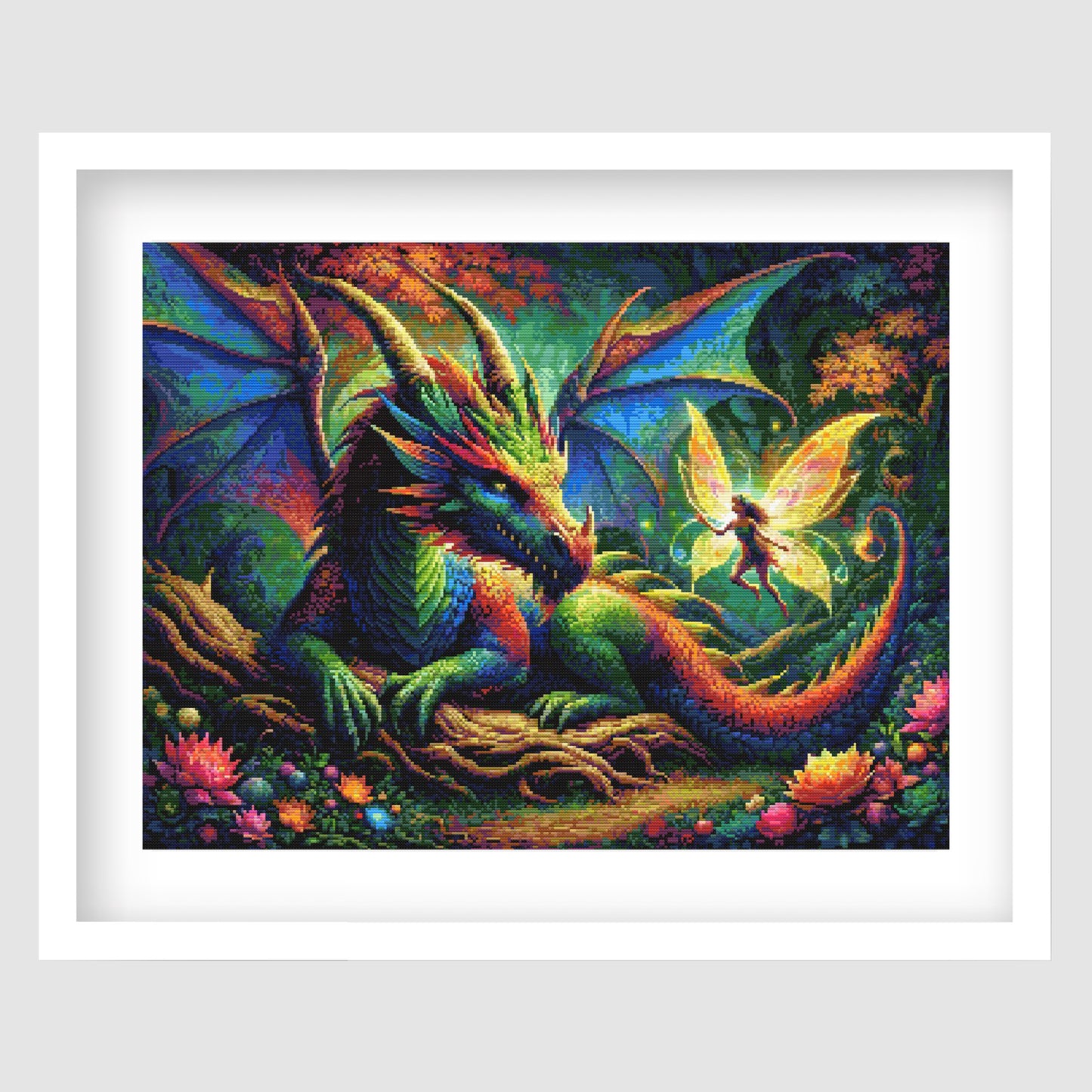 Dragon and Fairy Cross Stitch Pattern displayed as framed fantasy wall art with a colourful dragon, glowing fairy light, flowers, and enchanted forest detail.
