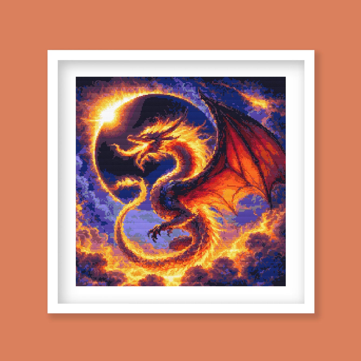 Dragon Solar Eclipse Cross Stitch Pattern displayed in a black frame as dark fantasy wall art with a fiery dragon and glowing eclipse.