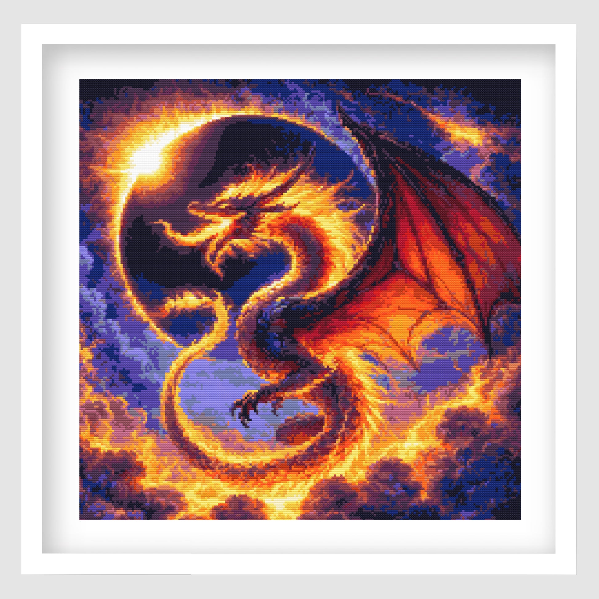 Dragon Solar Eclipse Cross Stitch Pattern displayed as framed wall art with a fiery dragon, glowing eclipse, orange flames, and dark fantasy detail.