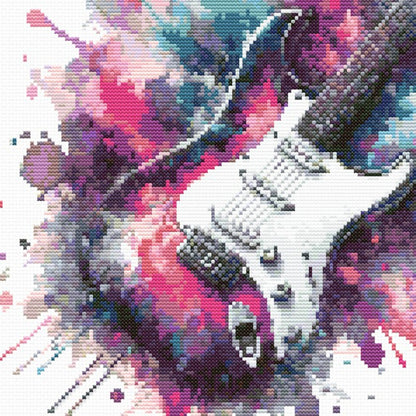 Close-up of Electric Guitar Cross Stitch Pattern showing the guitar body, colourful paint splash detail, and visible counted cross stitch texture.
