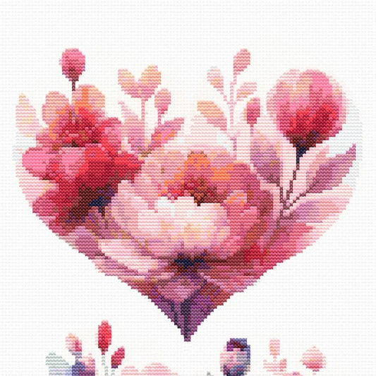 Close-up of Floral Heart Cross Stitch Pattern Set showing a pink floral heart with soft petals, botanical detail, and visible counted cross stitch texture.