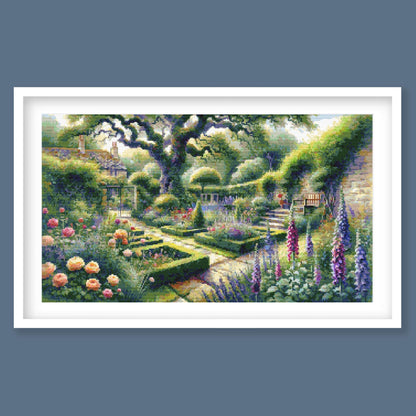 Framed artwork of a garden scene with flowers and a house.