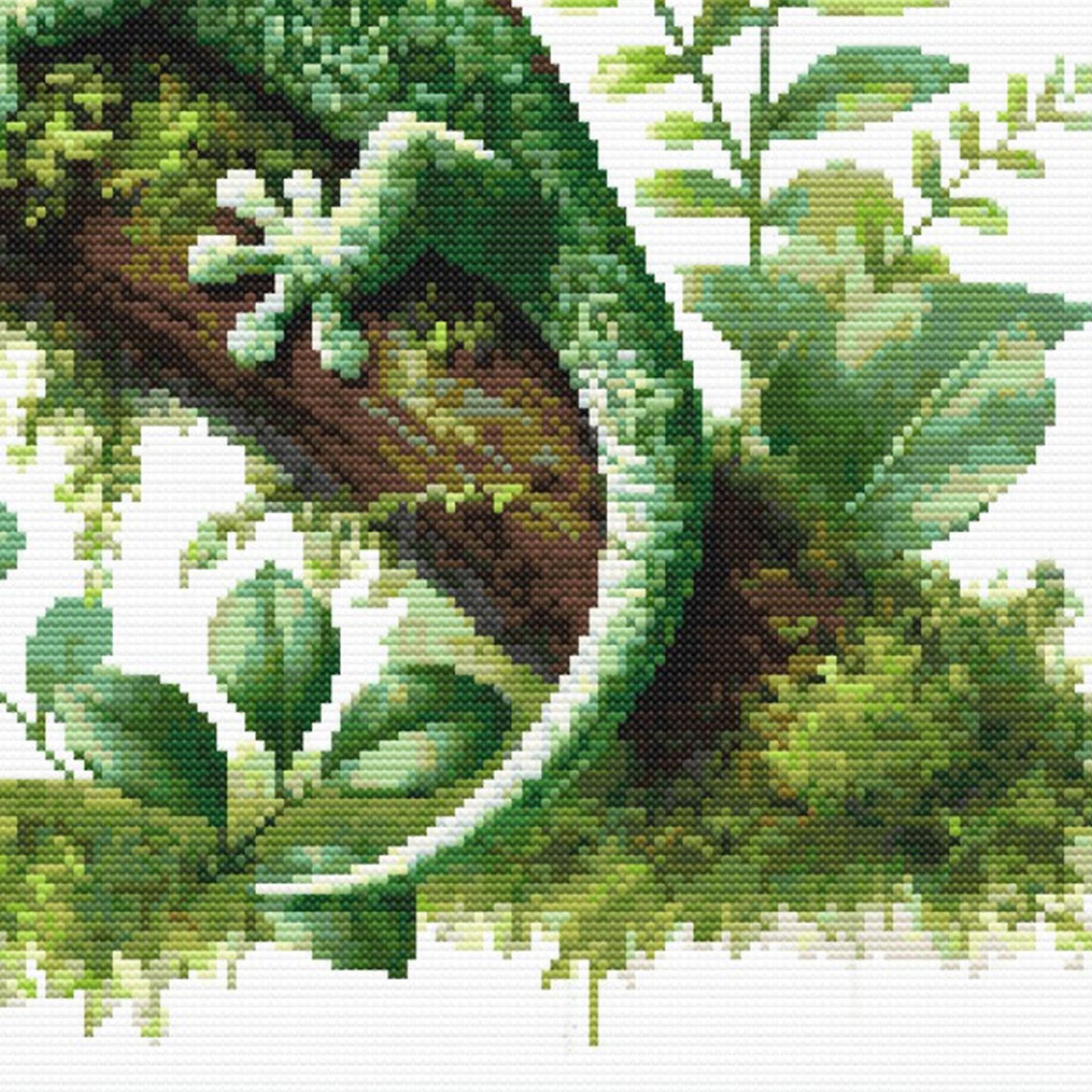 Close up of a Green Gecko Cross Stitch Pattern, Tropical Lizard Wildlife Embroidery showing the tail and leg on the a brown branch with green leaves.