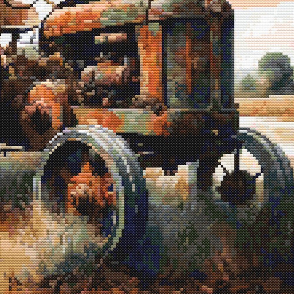 Vintage tractor cross stitch pattern detail showing weathered farm machinery, earthy colours, and rustic countryside character.
