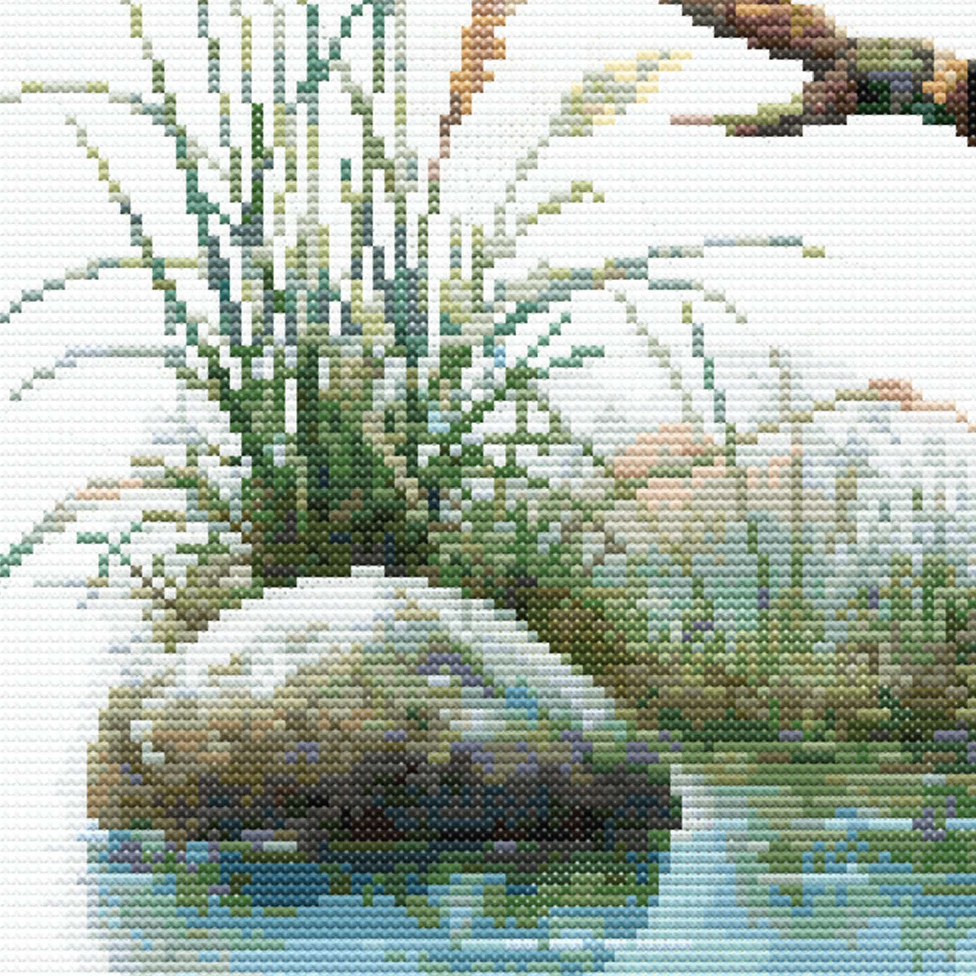 Close-up of Sacred Kingfisher Kōtare Cross Stitch Pattern showing reeds, water, rocks, and natural New Zealand wetland detail.