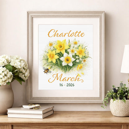 March Birth Flower Cross Stitch Pattern shown in a room preview as personalised floral wall art with a name and birth date.