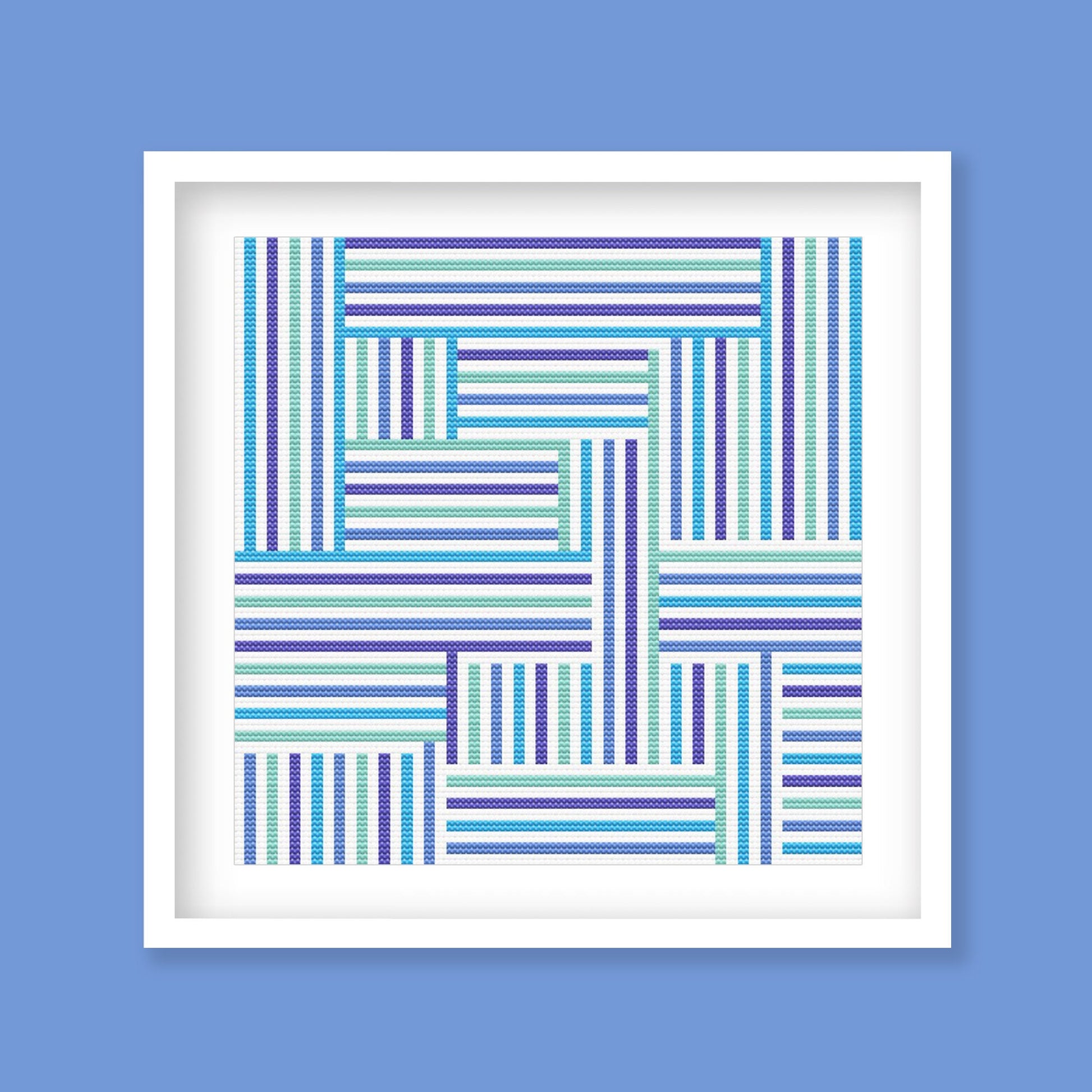 Modern Geometric Stripes Cross Stitch Pattern displayed as framed wall art with blue, teal, and purple striped linework in a clean abstract design.