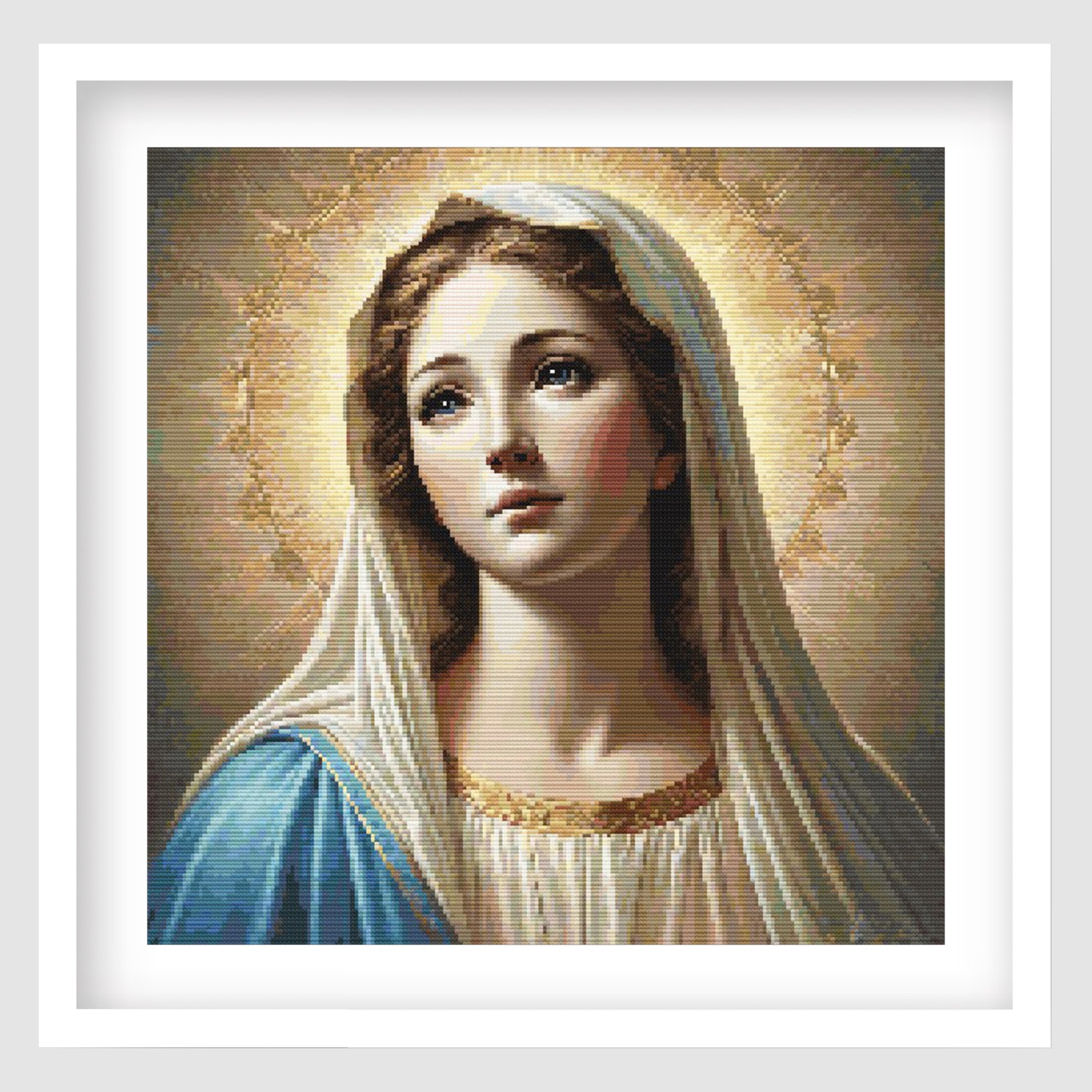 Virgin Mary Cross Stitch Pattern displayed as framed religious wall art with Mother Mary, soft halo, blue veil, and classic sacred art detail.