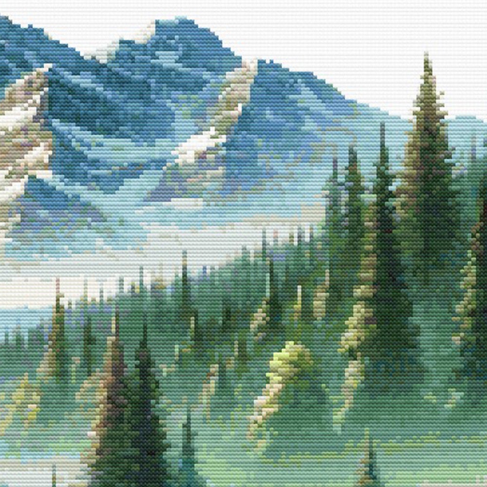 Mountain Cabin Retreat cross stitch pattern featuring a scenic mountain landscape with evergreen forest and river.