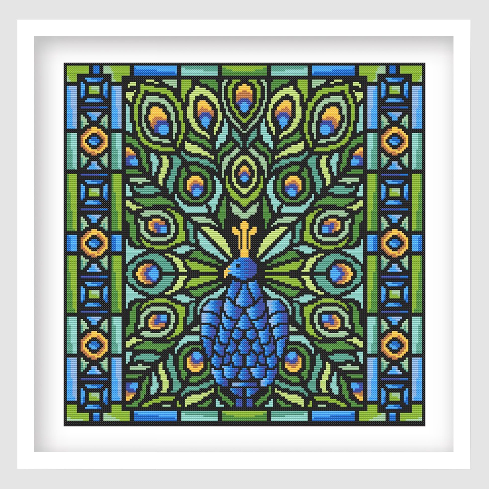Peacock Mosaic Cross Stitch Pattern displayed as framed wall art with a blue peacock, jewel-tone feathers, bold black outlines, and stained glass-inspired detail.