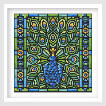 Peacock Mosaic Cross Stitch Pattern displayed as framed wall art with a blue peacock, jewel-tone feathers, bold black outlines, and stained glass-inspired detail.