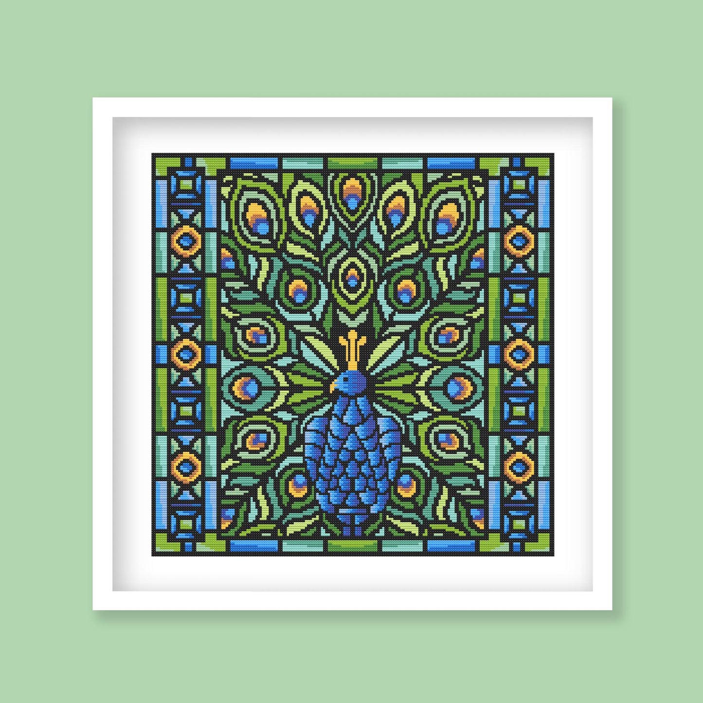 Framed artwork of a peacock design on a green background